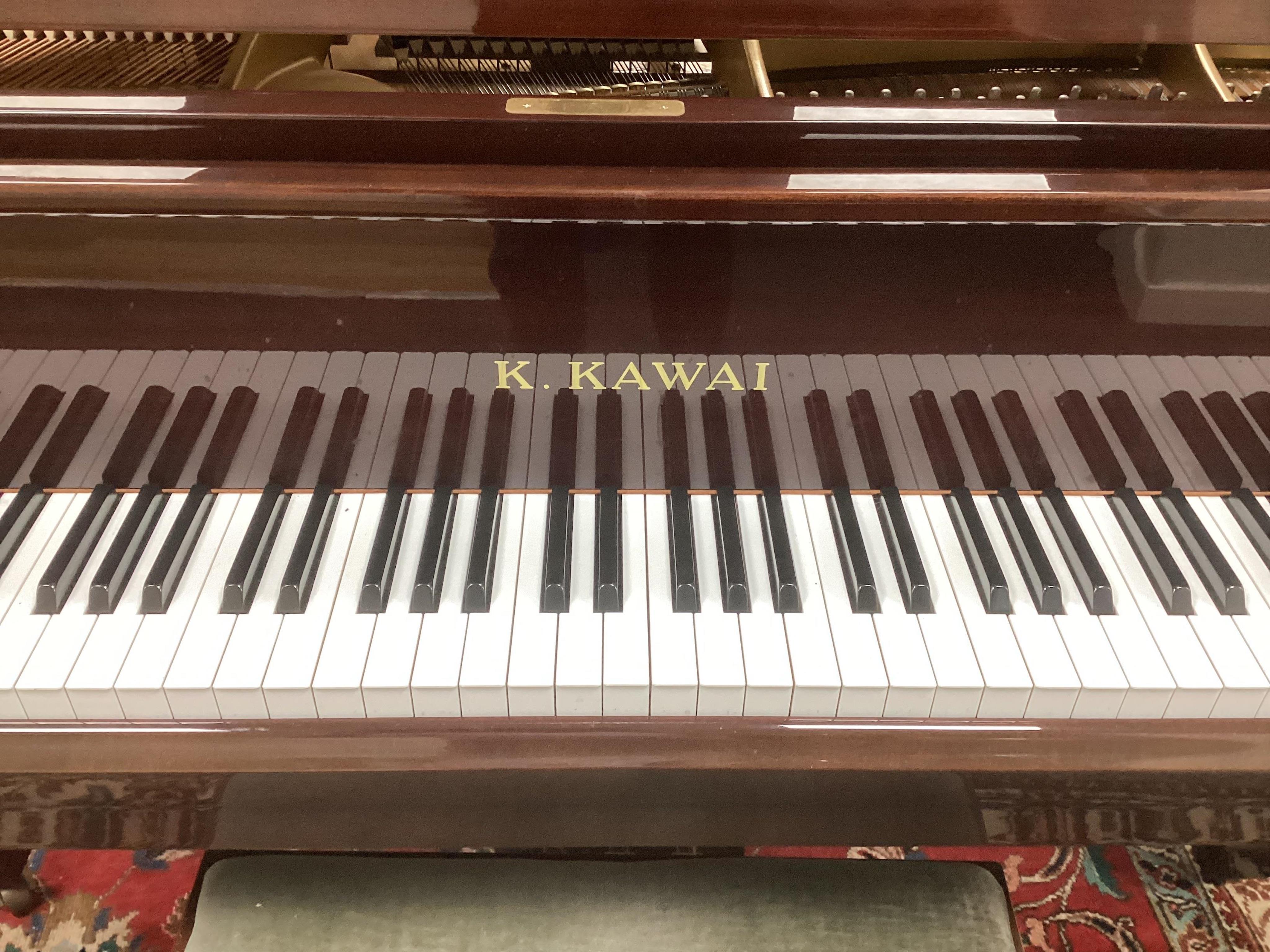 A Kawai KG-ID 5ft grand piano (c.1986), serial number 1675219, mahogany cased on square tapered legs, width 149cm, height 101cm, with adjustable stool. Condition - piano good